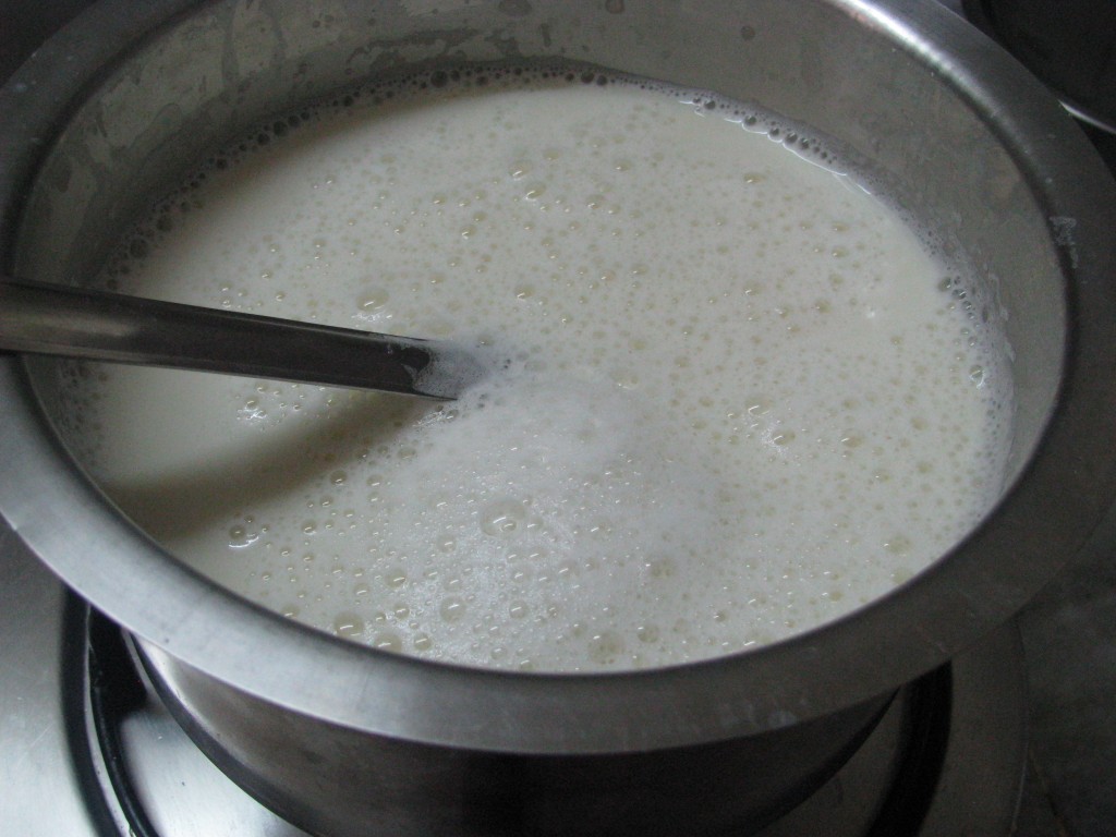 whisk soymilk continuously with spoon 