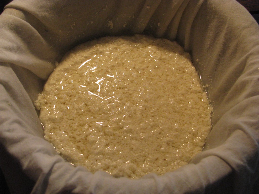 strain curdled soymilk with muslin cloth